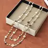 Colección Larga de Collares Superpuestos de Perlas Swarovski para Mujer, Estilo Lujo Ligero, Cadena Versátil para Suéter con un Toque de Alta Gama, Venta al por Mayor Otoño e Invierno