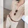 Camisa de punto de seda helada de manga corta hueca de alta gama estilo coreano, top casual de verano holgado con cuello polo y un aire de 'old money'