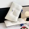 Almohada de núcleo de cápsula espacial de punto de cuatro caras, modelo nuevo 2026