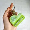 Nuevo Llavero de Mini Piano Transfronterizo Dibujo Animado Lindo Tocando el Piano Sanrio Juguete Musical Colgante Pequeño