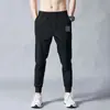 Pantalones Casuales Transpirables de Seda de Hielo Verano 2023 para Hombre Sueltos Pantalones de Aire Acondicionado para Hombre Pantalones Talla Grande de Nueve Puntos Elásticos Pantalones Deportivos