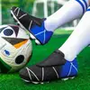 Zapatos de fútbol infantiles transfronterizos TF de tacos cortos talla 28-39 caña baja para jóvenes zapatos deportivos de entrenamiento para césped otros