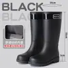 Botas de lluvia casuales impermeables, elásticas, para todas las estaciones, impermeables y antideslizantes, con forro de polar, estilos de media pantorrilla y alta para mujer para el invierno