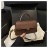 Bolso baguette pequeño cuadrado texturizado moderno y elegante para mujer 2025 Nueva Moda Francesa Color Sólido Viajero Un Hombro Cruzado