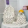 Mochila floral minimalista estilo floresta 2026 conjunto de três peças estilo campus transfronteiriço mochila escolar para alunos do ensino fundamental II e médio mochila de viagem