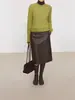 Saia Midi PU com Linha Dividida Consciente de Design Feminina 26 Outono/Inverno Nova Saia Midi Linha A Emagrecedora Saia de Couro Quatro Belezas 1722