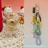 Colgante de oro de perro canela 999 de oro puro, cordón de oso violento serie Sanrio, regalo promocional de tienda de oro