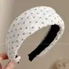 Diadema retorcida fresca y elegante, de lujo ligero para mujer, adecuada para el uso diario en primavera y verano, diadema de ala ancha, dulce accesorio para el cabello estilo coreano