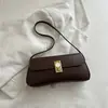 Bolsos con Textura de Otoño Viaje al Trabajo 2026 Diseño Nuevo Moda Femenina Nicho Bolso de Axila Bolso tipo Baguette de un Solo Hombro Simple
