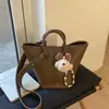 Bolsos de Alta Gama Texturizados Transfronterizos para Mujer 2025 Nueva Moda Bolso Cruzado Versátil Bolso de Mano Súper Popular Bolso Cubo Bolso de Mano
