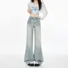 Nuevos jeans de mujer estilo picante y dulce para otoño con un diseño de cintura único, retro americano, no ajustados, ligeramente acampanados, disponibles para venta al por mayor
