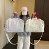 Bolsa de viagem transfronteiriça de alta qualidade, elegante, com laço, de grande capacidade, mala de bagagem, bolsa de ombro, bolsa tote acolchoada, bolsa de academia e bolsa de mão