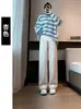 Pantalones de maternidad de pierna ancha de tiro alto con rayas verticales para usar antes y después del embarazo, con una textura suave y un corte relajado
