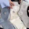 Calcetines largos de lunares caricatura japonesa perro pequeño calcetines holgados calcetines coreanos calcetines de media pantorrilla para mujer lazo ins en stock