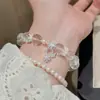 Pulsera de Cristal Blanco Natural con Diseño de Mariposa y Copo de Nieve, Estilo de Lujo Ligero Nicho de Gama Alta, Perlas Swarovski, Accesorios de Otoño e Invierno Navideños