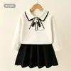 Conjunto de suéter y falda para niña lindo elegante conjunto infantil de dos piezas color block solapa estilo camelia conjunto de punto para niña