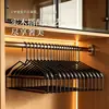 Perchero de madera maciza de lujo ligero transfronterizo, armario de alta gama para el hogar de arte en hierro, perchero y tendedero de madera para habitación de trajes y abrigos