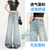 Nuevo estilo de verano con tacto de seda helada, diseño de orejas de gato, corte holgado, no se pega, jeans ligeramente acampanados para mujer, admite envío directo