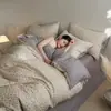 Estilo minimalista nuevo juego de cuatro piezas de gasa de doble capa transpirable 100% algodón para dormitorio, ropa de cama de dos tonos estampada estilo INS 100% algodón