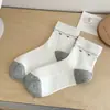 Calcetines lindos de encaje para mujer, otoño e invierno, estilo femenino, adorables, sin costuras, estampado floral, longitud hasta la pantorrilla, algodón, estilo preppy, calcetines con volantes