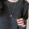 Collar Minimalista con Colgante de Corazón Plateado para Mujer Otoño e Invierno Lujo Accesible Acero de Titanio de Alta Gama Cadena Larga Deslizante para Suéter Accesorios