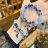 Pulseira de Gota d'Água com Laço Azul Design de Pulseira de Nicho Periférico Com Contas Doce Chapeuzinho Vermelho recomendar Pulseira para Melhor Amiga