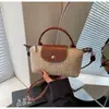Mini Bolso Tejido de Verano para Mujer 2026 Nuevo Estilo Bolso de Hombro Único Cruzado Bolso Pequeño para Vacaciones en la Playa Bolso Cubo
