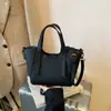 Bolso de Mano de Alta Gama Versátil de Nicho Nuevo para Mujer Textura Retro Hombro Único Cruzado Cubo Bolso de Viaje