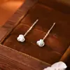 Pendientes de nudo Ruyi estilo socialité de lujo ligero pendientes de borla de bola auspiciosa Anillo de Amazon envuelto en nudo concéntrico línea de oreja corta