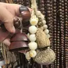 Cascabel de Concha de Fruta con Cadena de Semillas Retro Naturales que Cumplen Deseos Llavero de Semilla de Bodhi Colgante de Estilo Étnico Tejido a Mano para Bricolaje