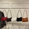 Bolsa Baguete Texturizada Elegante de Cor Sólida Grande Capacidade Retro Nova Moda Outono e Inverno 2025 Bolsa de Ombro Único para Ombro/Axila para Mulheres