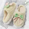 Chinelos de algodão com laço femininos outono e inverno internos para casa antiderrapantes com sola grossa domésticos de pelúcia quentes sapatos lua femininos atacado
