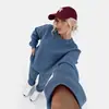 Top casual estilo americano de cuello redondo y manga larga, adelgazante y cómodo para usar en casa, actividades al aire libre y deportes; Pantalones de chándal con cintura de cordón y pierna cónica, conjunto de dos piezas
