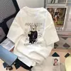 Venta al por mayor de fábrica Camiseta de verano de manga corta de PU Shuai americano, estilo ins de moda, holgada, estampada, simple, todo vale