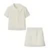 Atacado Fábrica de Roupas Femininas Transfronteiriça 2026 AliExpress INS Conjunto de Jaqueta de Tricô Manga Curta com Franjas + Minissaia de Cintura Alta