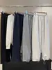 ¡Un par para el invierno! Pantalones gruesos de forro polar de coral, 750 g, con puños elásticos, pierna ancha, casual, joggers, versátiles, nuevos 2026