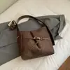 Bolso Cubo Personalizado, Sencillo y de Moda, Textura Casual, Bolso de Nuevo Estilo, Bolso de Hombro Cruzado para Mujer Otoño e Invierno 2026