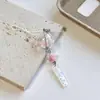 Campanilla de viento de flor de cerezo rosa Hecha a mano con cuentas Simple Cadena para teléfono Ins Colgante Lindo Álbum de tarjetas Goo Bolso de cámara Colgante