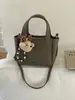 Bolso Cubo Portátil Súper Popular para Mujer 2026 Nueva Moda Versátil Bolso de Hombro Cruzado Bolso de Mano de Alta Gama para Viajes Diarios