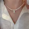 Collar de perlas de metal plateado de alta calidad para mujer, popular estilo francés, cadena para la clavícula, collar simple y versátil para el temperamento