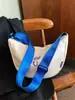 Bolsa de moda leve para mulheres 2023 nova verão popular bolsa de ombro em tecido Oxford design de nicho bolsa tiracolo de bolinho