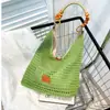 Bolso de mujer estilo casual 2026 nuevo verano súper popular tejido para vacaciones bandolera bolsa de mano para ir al trabajo de gran capacidad