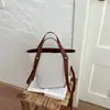 Bolsa pequena de tecido bicolor para mulheres, novo modelo 2026, bolsa de mão estilo cesta, bolsa saco, bolsa tiracolo texturizada para outono e inverno