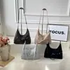 Otoño 2026 Nuevo Diseño de Nicho de Moda Gran Capacidad Moda Versátil Alta Apariencia Textura Bolso de Hombro Único Portátil Cruzado
