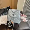 Mochila de mujer transfronteriza estilo coreano inspirada en Chanel 2026 nuevo modelo mochila para el día a día acolchada versátil bolso cubo con cadena