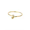 Anillo apilable de circonita de alta calidad bañado en oro de 18 quilates de cobre, muy vendido, nicho de lujo accesible, anillo pulido, joyería de mano que no se decolora