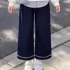 Conjunto de duas peças para crianças de porte médio e grande, coleção primavera/outono 2026, estilo coreano, top de moda com design listrado e blocos de cor, e calça jeans estilo coreano