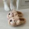 Zapatillas de peluche suaves y lindas de oso de dibujos animados para mujer, otoño e invierno 2026, con forro polar añadido para mayor calidez, antideslizantes, lindas zapatillas peludas para el hogar