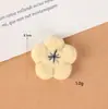 Nuevo Punto Mayorista Felpa Flor de Cinco Pétalos Cabeza de Conejo Linda Dibujos Animados Accesorios Decoración Sombreros, Zapatos y Calcetines para Niños