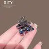 Nuevo y lujoso pasador de pelo de mariposa azul con incrustaciones de diamantes completos, pasador metálico para el flequillo de mujer de alta resistencia con adornos de diamantes, accesorio para el pelo de media coleta